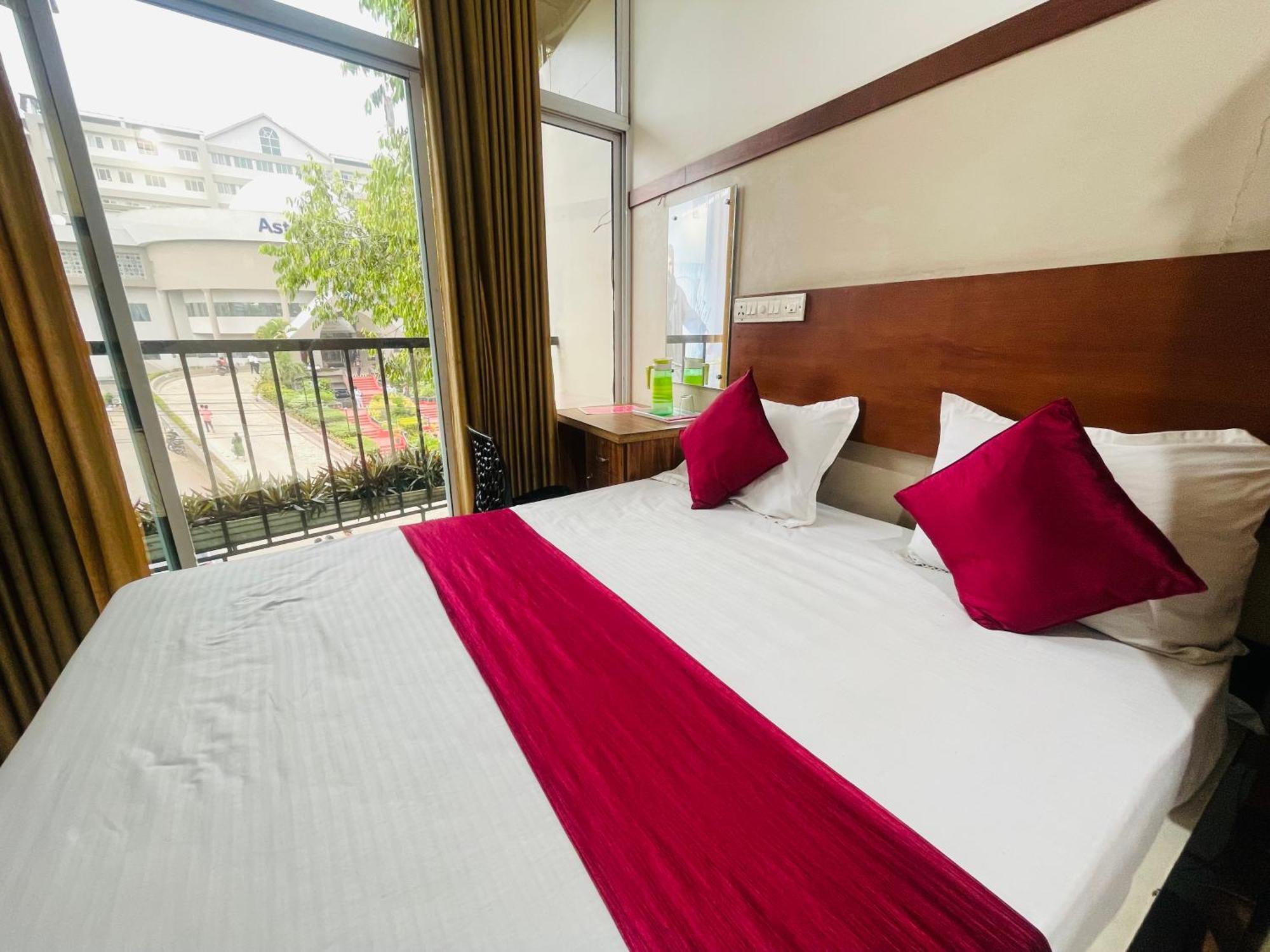 Rio Rooms Mims Calicut Bagian luar foto